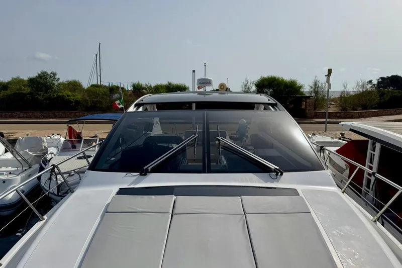 Dena Yacht Photos Pics 2021 Airon Cinquanta 50 yacht docked, showcasing sleek design and modern features.