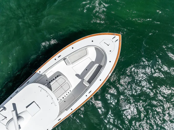 Engine Warranty X Seakeeper Yacht Photos Pics Aerial view of 2021 Valhalla Boatworks V-41 on green water.