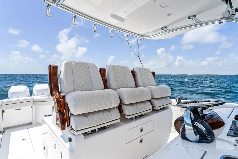 Engine Warranty X Seakeeper Yacht Photos Pics Luxurious seating on 2021 Valhalla Boatworks V-41, ocean backdrop, clear skies.