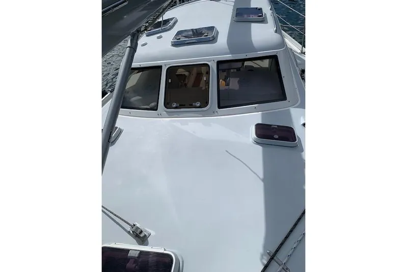 Tumblehome Yacht Photos Pics 1995 Little Harbor 51 Pilothouse yacht deck with windows and hatches.