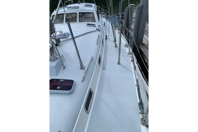 Tumblehome Yacht Photos Pics 1995 Little Harbor 51 Pilothouse yacht deck with sleek design and sturdy railings.