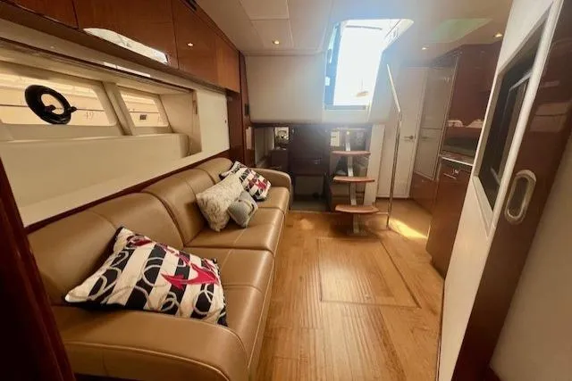 Stay Loose Yacht Photos Pics Luxurious interior of 2013 Sea Ray 410 Sundancer yacht with leather seating and modern design.