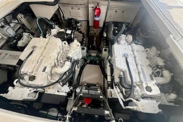 Stay Loose Yacht Photos Pics Engine room of 2013 Sea Ray 410 Sundancer with dual engines and fire extinguisher.