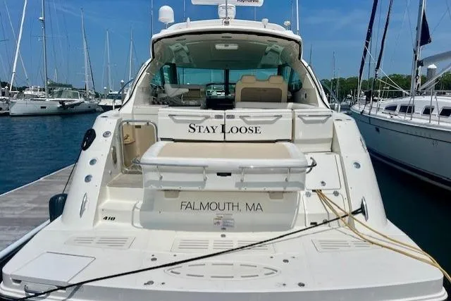 Stay Loose Yacht Photos Pics 2013 Sea Ray 410 Sundancer yacht docked, named "Stay Loose," in Falmouth, MA marina.