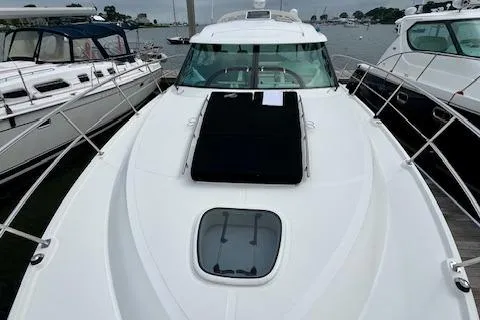 Stay Loose Yacht Photos Pics 2013 Sea Ray 410 Sundancer yacht docked, showcasing sleek design and spacious deck.