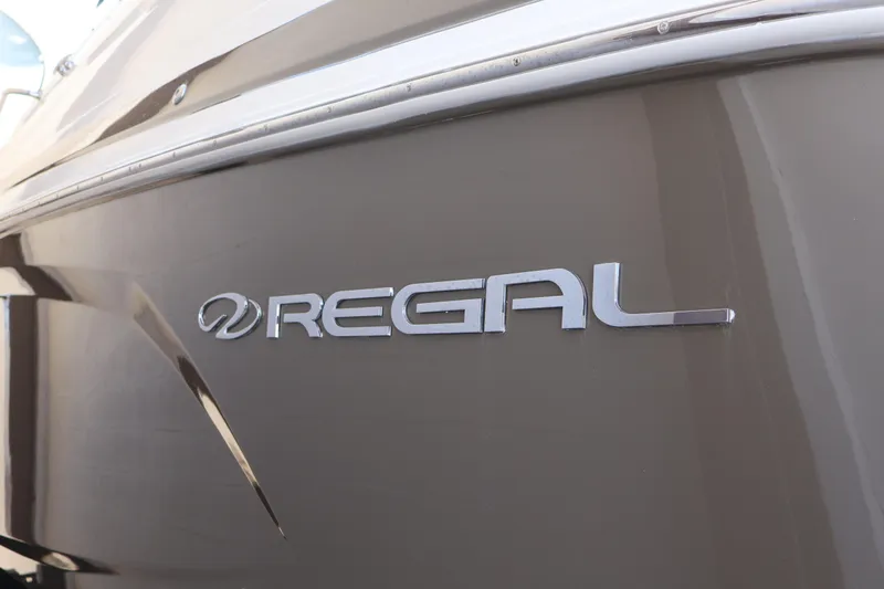  Yacht Photos Pics 2018 Regal 28 Express boat logo on sleek hull.