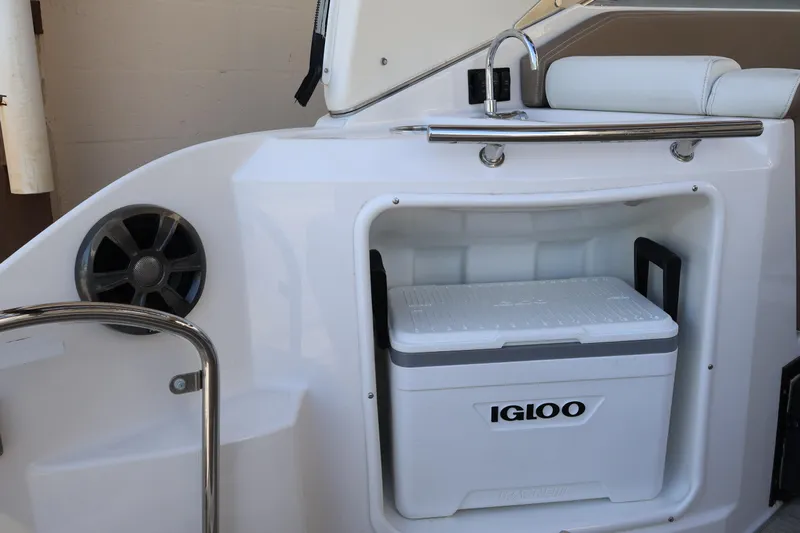  Yacht Photos Pics 2018 Regal 28 Express boat interior with Igloo cooler and speaker.