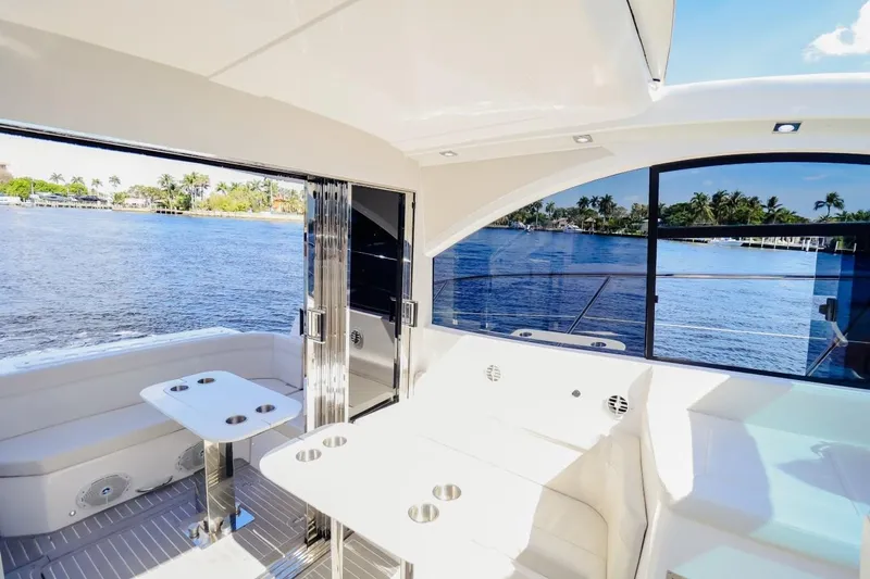  Yacht Photos Pics Luxurious 2021 Evolve 400HT yacht interior with scenic waterfront view.
