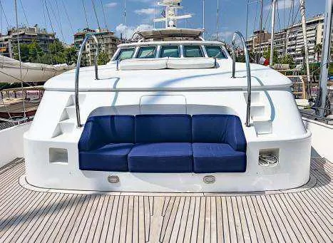  Yacht Photos Pics Codecasa 32m 1999 yacht with blue cushioned seating on deck.