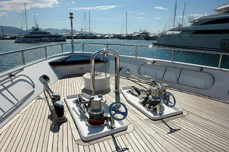  Yacht Photos Pics Codecasa 32m 1999 yacht deck with winches and marina view.