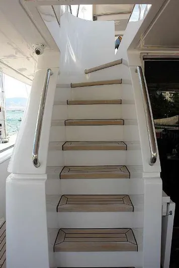  Yacht Photos Pics Staircase on a 1999 Codecasa 32m yacht with stainless steel handrails.