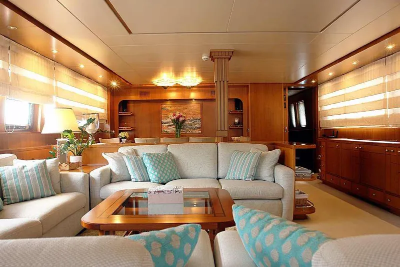  Yacht Photos Pics Luxurious interior of 1999 Codecasa 32m yacht with elegant seating and decor.