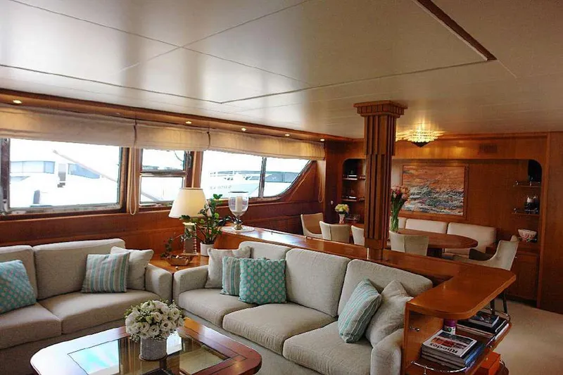  Yacht Photos Pics Luxurious interior of 1999 Codecasa 32m yacht with elegant seating and dining area.