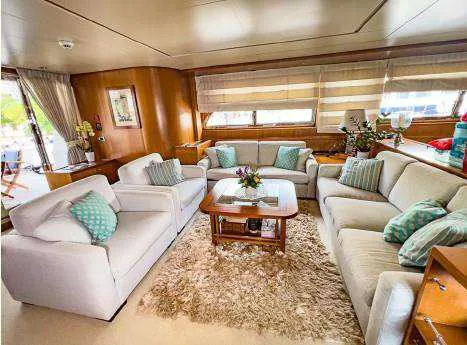  Yacht Photos Pics Luxurious Codecasa 32m 1999 yacht interior with plush seating and elegant decor.