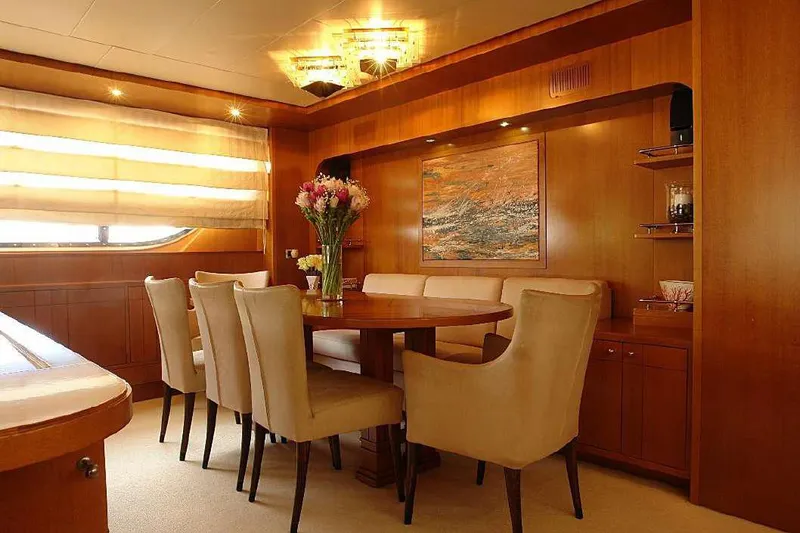  Yacht Photos Pics Luxurious dining area on a 1999 Codecasa 32m yacht with elegant decor.