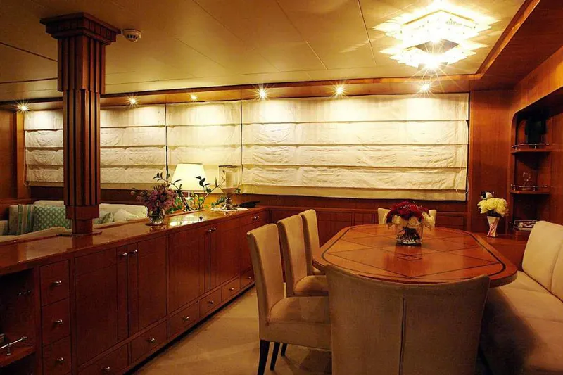  Yacht Photos Pics Luxurious interior of a 1999 Codecasa 32m yacht with elegant dining area.