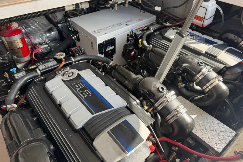  Yacht Photos Pics Engine compartment of a 2013 Regal 35 Sport Coupe, featuring dual 6.2-liter engines.