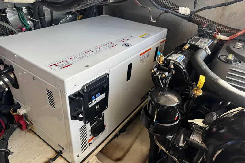  Yacht Photos Pics Engine compartment of a 2013 Regal 35 Sport Coupe featuring a Kohler generator.