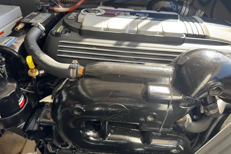  Yacht Photos Pics Engine compartment of a 2013 Regal 35 Sport Coupe, showcasing detailed components.