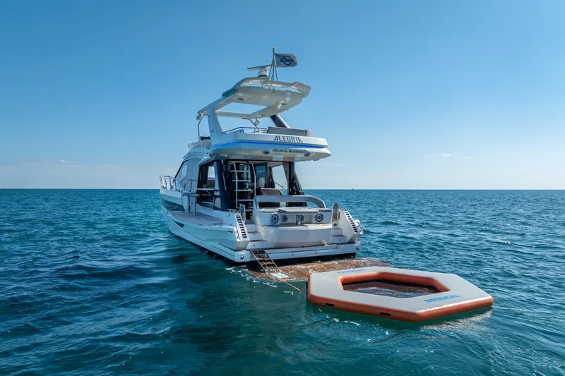  Yacht Photos Pics 2021 Galeon 500 Fly yacht on open sea with floating platform.