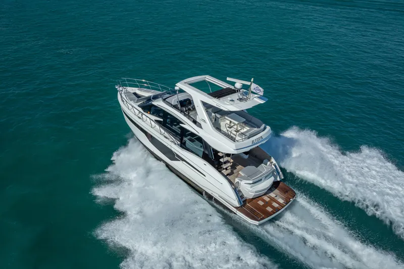  Yacht Photos Pics 2021 Galeon 500 Fly yacht cruising on open water, aerial view.