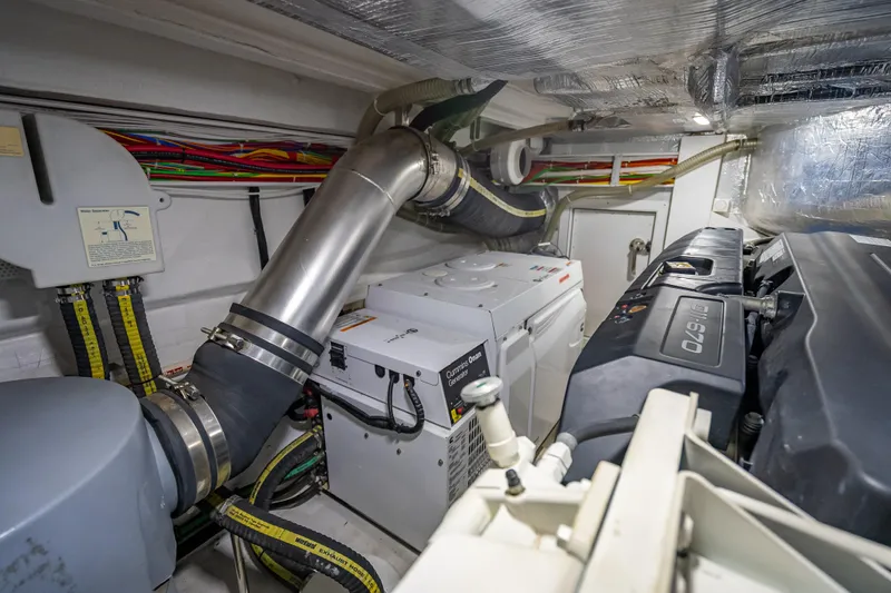  Yacht Photos Pics Engine room of 2021 Galeon 500 Fly yacht with Cummins Onan generator.