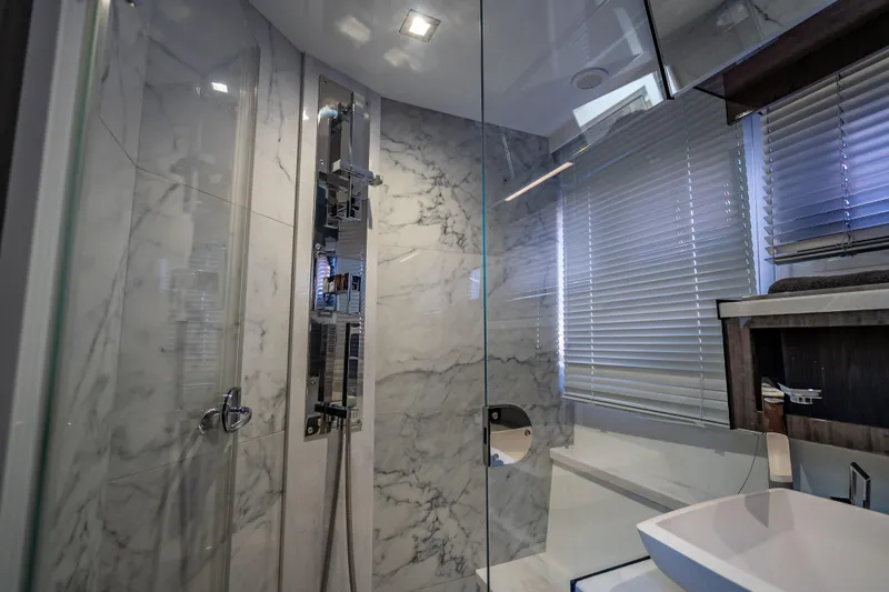  Yacht Photos Pics Luxurious bathroom with marble walls in 2021 Galeon 500 Fly yacht.