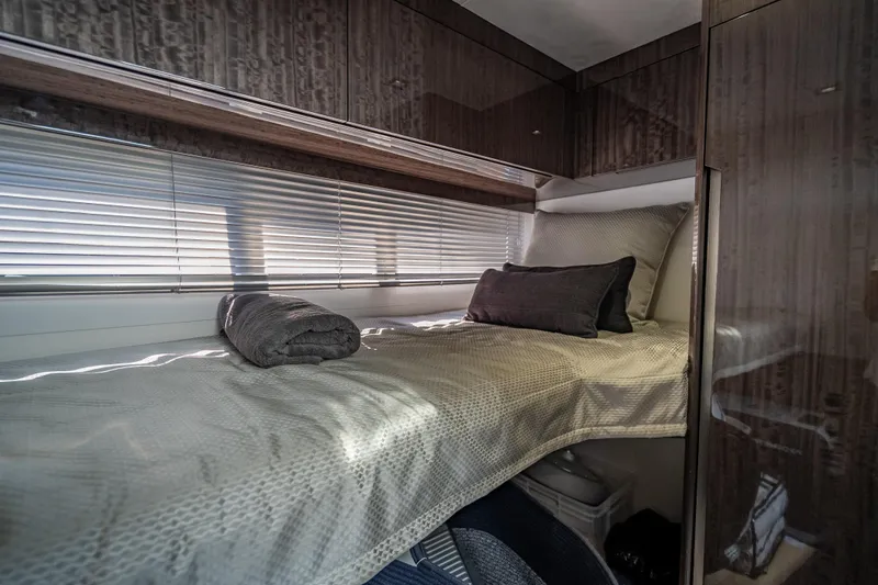  Yacht Photos Pics Luxurious cabin interior of 2021 Galeon 500 Fly yacht with cozy bedding.