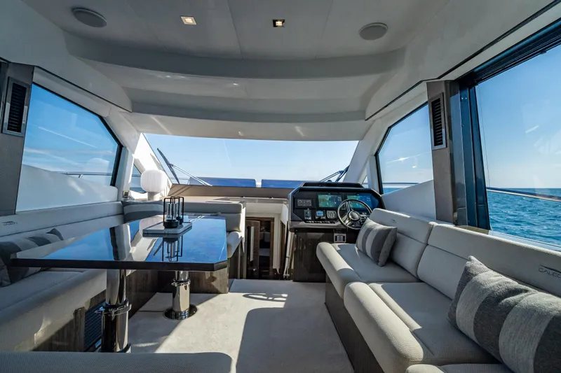  Yacht Photos Pics Luxurious interior of 2021 Galeon 500 Fly yacht with modern seating and ocean view.