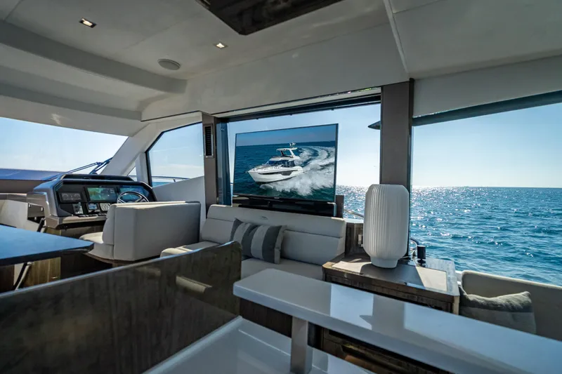  Yacht Photos Pics Luxurious interior of 2021 Galeon 500 Fly yacht with ocean view and modern amenities.
