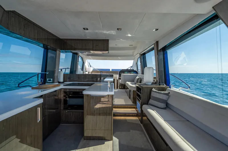  Yacht Photos Pics Luxurious interior of 2021 Galeon 500 Fly yacht with ocean view.