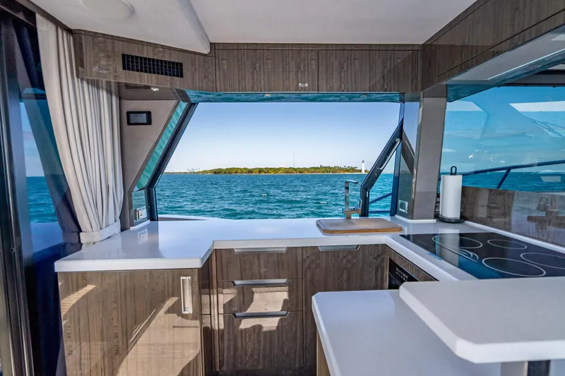  Yacht Photos Pics Modern kitchen interior on 2021 Galeon 500 Fly yacht with ocean view.