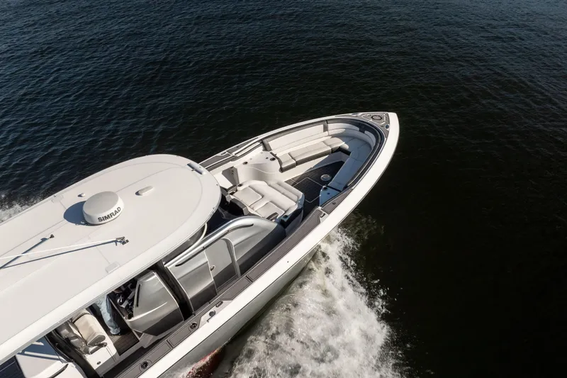  Yacht Photos Pics 2020 Fountain 43 NX boat cruising on open water, aerial view.