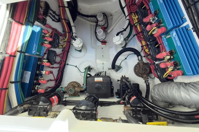  Yacht Photos Pics Electrical system of a 2022 Intrepid 407 Panacea boat, showcasing wiring and components.