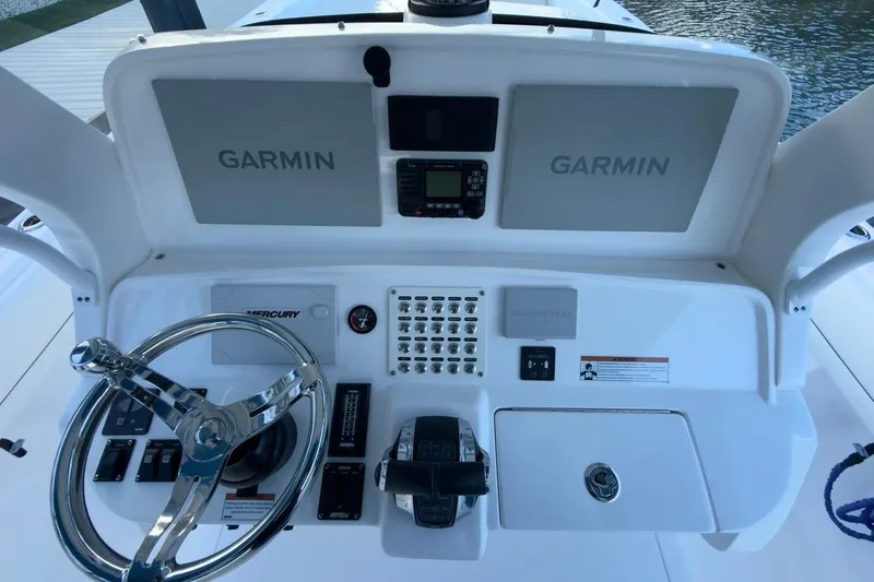  Yacht Photos Pics Control panel of 2022 Intrepid 407 Panacea boat with Garmin navigation system.