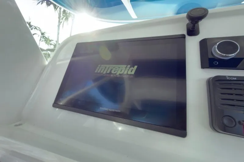 Yacht Photos Pics 2022 Intrepid 407 Panacea dashboard with Garmin display and control panel.