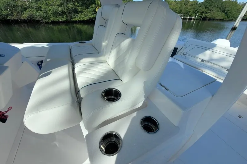  Yacht Photos Pics White seating with cup holders on a 2022 Intrepid 407 Panacea boat.