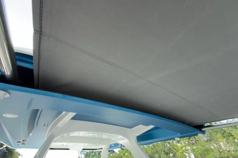  Yacht Photos Pics 2022 Intrepid 407 Panacea boat canopy and structure, showcasing sleek design and craftsmanship.