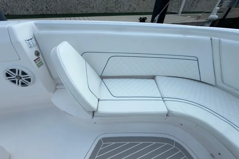  Yacht Photos Pics Luxurious seating on 2022 Intrepid 407 Panacea boat, featuring white quilted upholstery.
