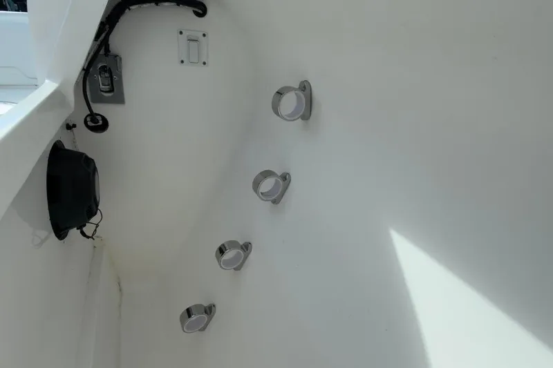  Yacht Photos Pics Interior view of 2022 Intrepid 407 Panacea boat, featuring wall-mounted fixtures.