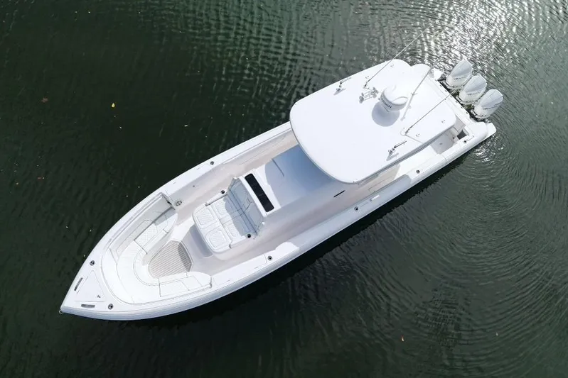  Yacht Photos Pics Aerial view of 2022 Intrepid 407 Panacea boat on calm water.