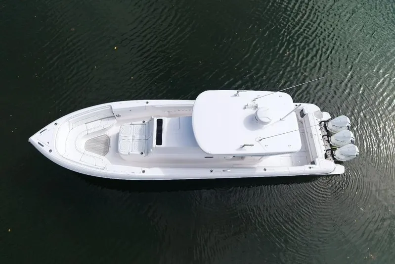  Yacht Photos Pics Aerial view of 2022 Intrepid 407 Panacea boat on calm water.