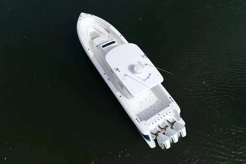  Yacht Photos Pics Aerial view of 2022 Intrepid 407 Panacea boat on calm water.