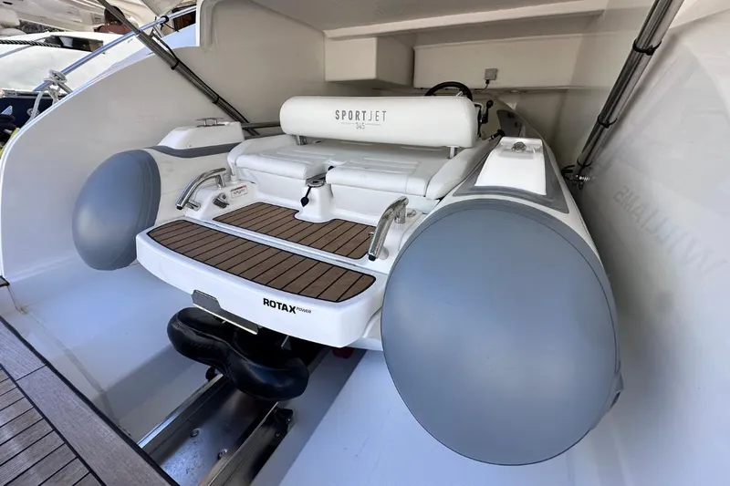  Yacht Photos Pics 2023 Princess S62 yacht with SportJet 345 tender in storage compartment.
