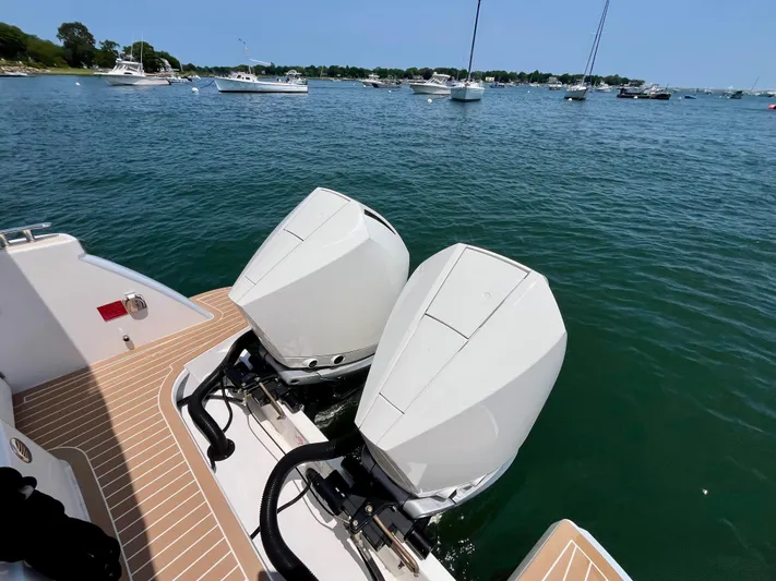 Waterlee Yacht Photos Pics 2019 MJM 35z boat with dual outboard engines on a sunny day.