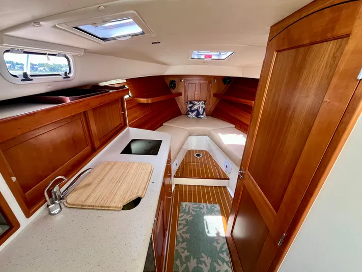 Waterlee Yacht Photos Pics Luxurious interior of 2019 MJM 35z boat with wood finish and modern amenities.
