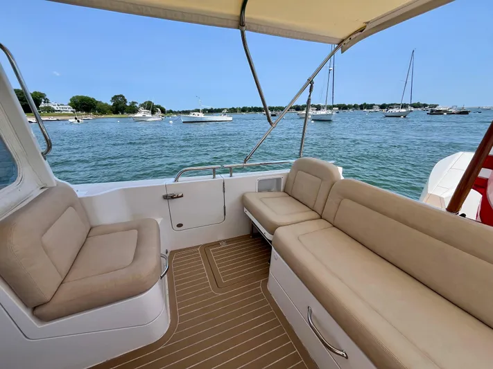Waterlee Yacht Photos Pics Spacious seating area on a 2019 MJM 35z boat with scenic water view.