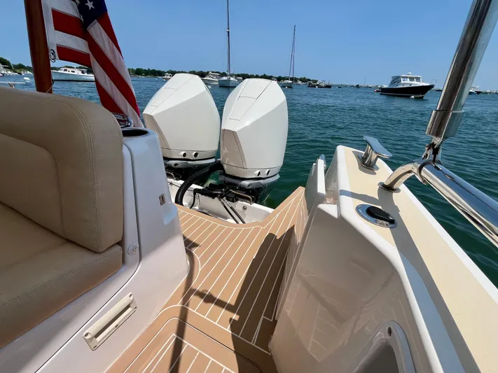 Waterlee Yacht Photos Pics 2019 MJM 35z boat with dual engines, docked on a sunny day, featuring a spacious deck.