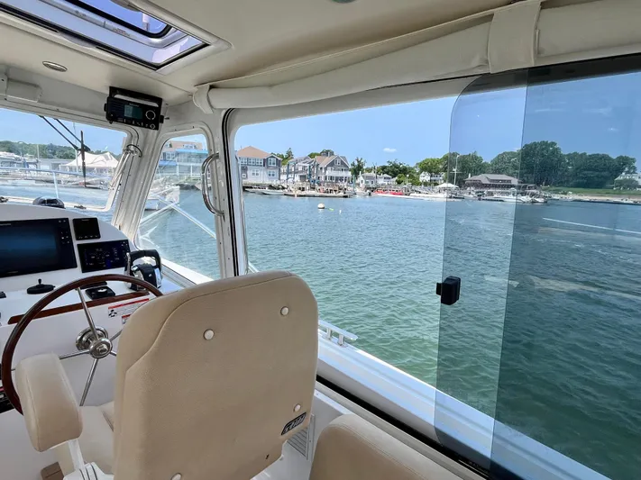 Waterlee Yacht Photos Pics Interior view of 2019 MJM 35z boat with waterfront scenery.