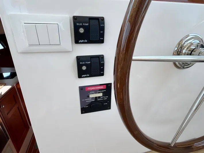 Waterlee Yacht Photos Pics Control panel and steering wheel of 2019 MJM 35z boat interior.